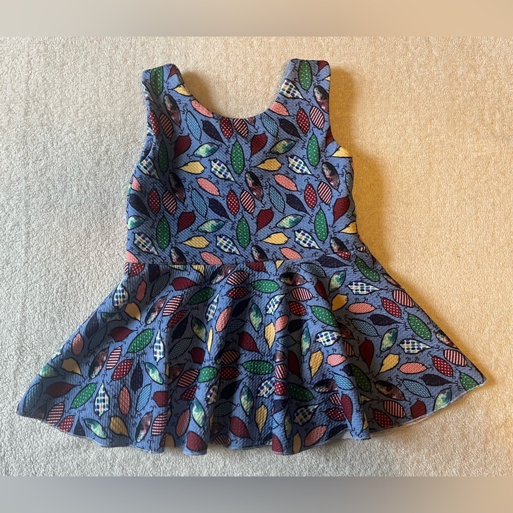 Boutique brand peplum top, Christmas light design. Toddler sz 3T